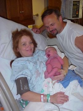 Mike and Sheri holding last new baby